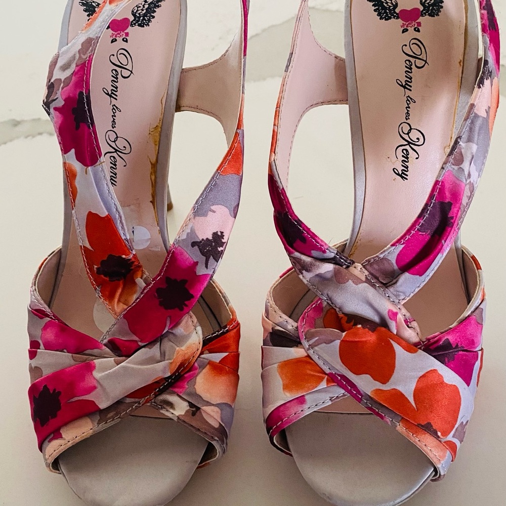 floral high heels. Size 7M. New. still has stickers on inside.